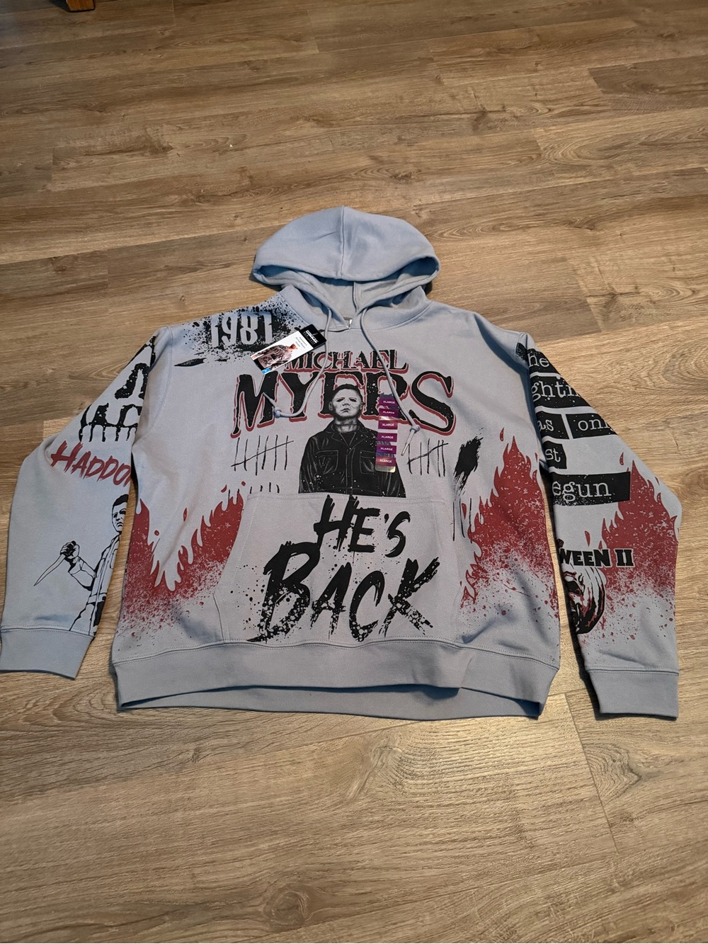 Freeze Light Blue Michael Myers Hoodie with Red Flame Graphics